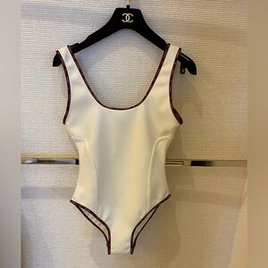 Chanel 25C 1 piece swimming suit in white with burgundy edges in size 40.